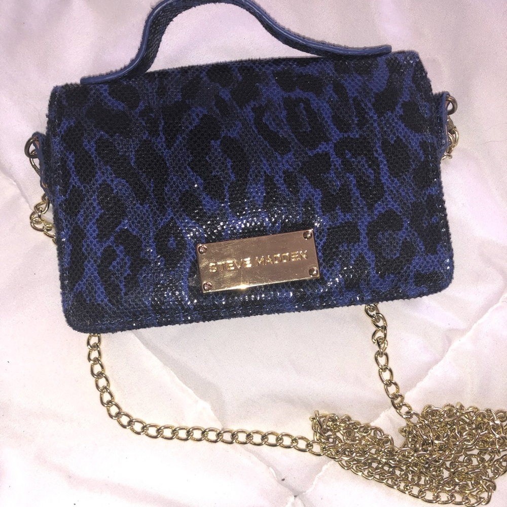 Steve Madden Blue leopard purse.